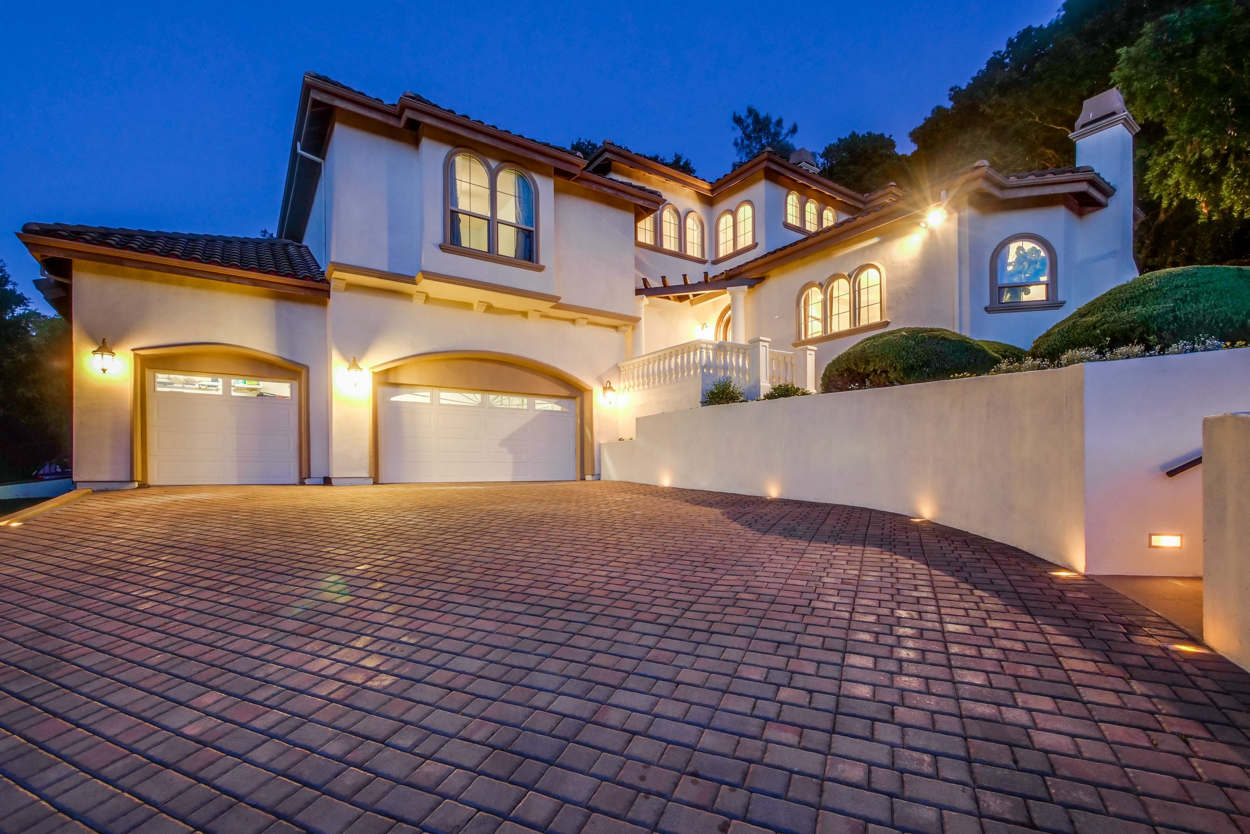 Beautiful lit up stone driveway